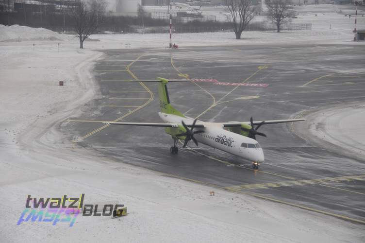 Another airBaltic plane waiting for take-off.