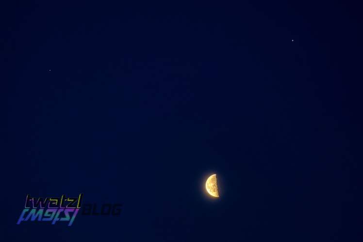 The moon with Jupiter (right) and Saturn (left)